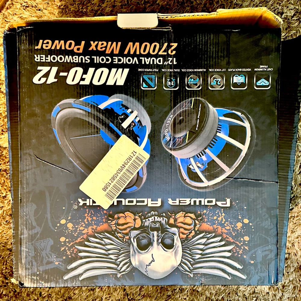 2 Power Acoustik Subwoofer and 1 Planet Audio amplifier